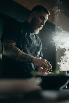 friendly male chef preparing pizza dough kitchen